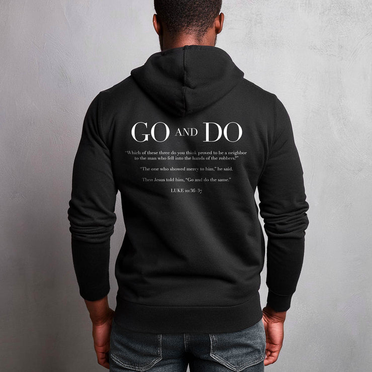 Black pullover hoodie with Go and Do graphic based on Luke 10:36