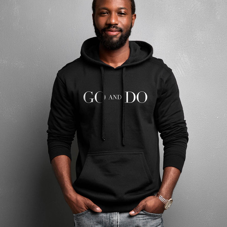 Black pullover hoodie with Go and Do graphic based on Luke 10:36