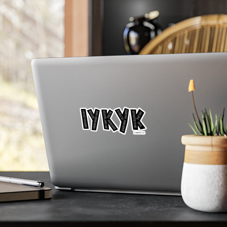 Vinyl decal on laptop with IYKYK graphic based on 2 Timothy 1:12