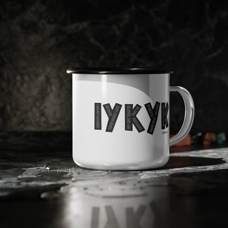 White campsite mup with IYKYK graphic based on 2 Timothy 1:12