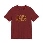 Maroon t-shirt with 'MARY KNEW' text in gold on a white background