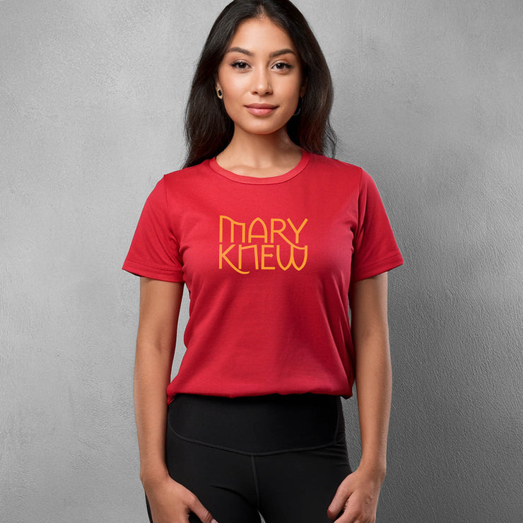 Female wearing a red t-shirt with 'MARY KNEW' text on a gray background