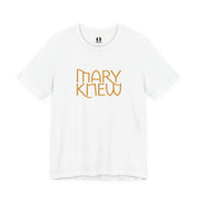 White t-shirt with 'MARY KNEW' text in gold on a white background