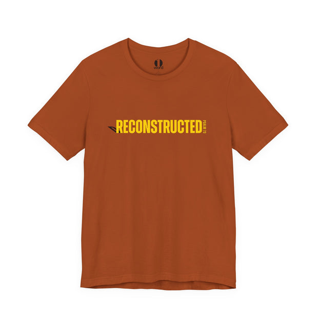 Burnt orange T-shirt with yellow RECONSTRUCTED text and Psalm 73 reference