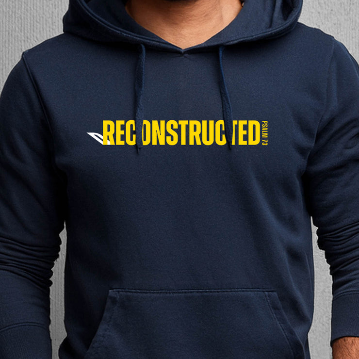 Detail of man wearing navy blue hoodie with yellow RECONSTRUCTED text and Psalm 73 reference