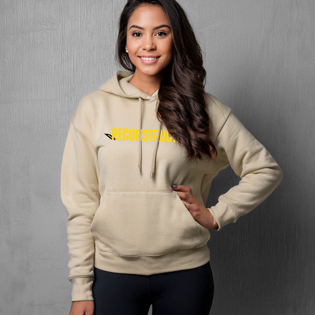 Woman wearing sand hoodie with yellow RECONSTRUCTED text and Psalm 73 reference