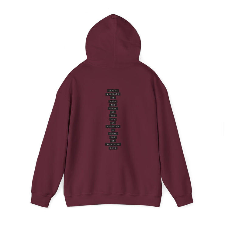 Maroon pullover hoodie with Redeemed graphic based on Galatians 3:13