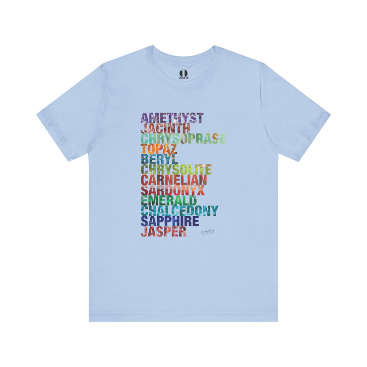 Light blue t-shirt with colorful text design on a white background