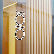 Sozo vinyl decal on window