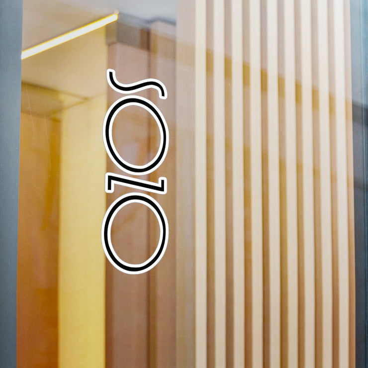 Sozo vinyl decal on window