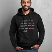 Man wearing black hoodie with graphic based on 2 Corinthians 4:8–9