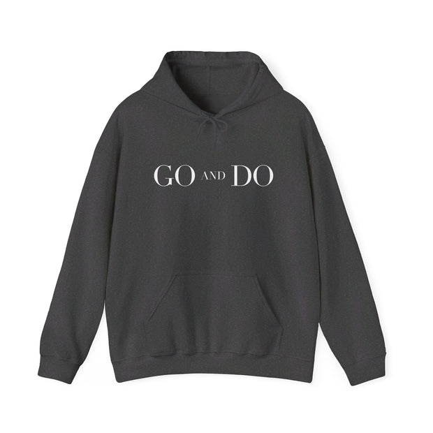 Dark heather gray pullover hoodie with Go and Do graphic based on Luke 10:36