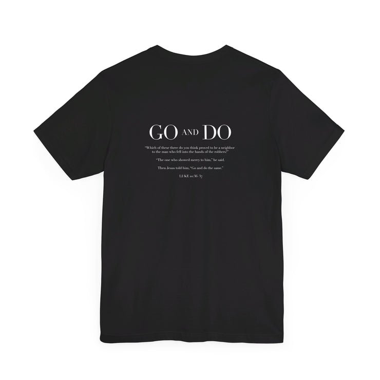 Black unisex t-shirt with Go and Do graphic based on Luke 10:36