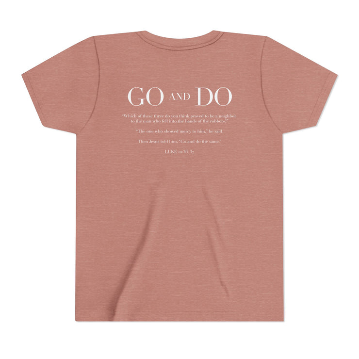 Mauve t-shirt with text on the back on a white background
