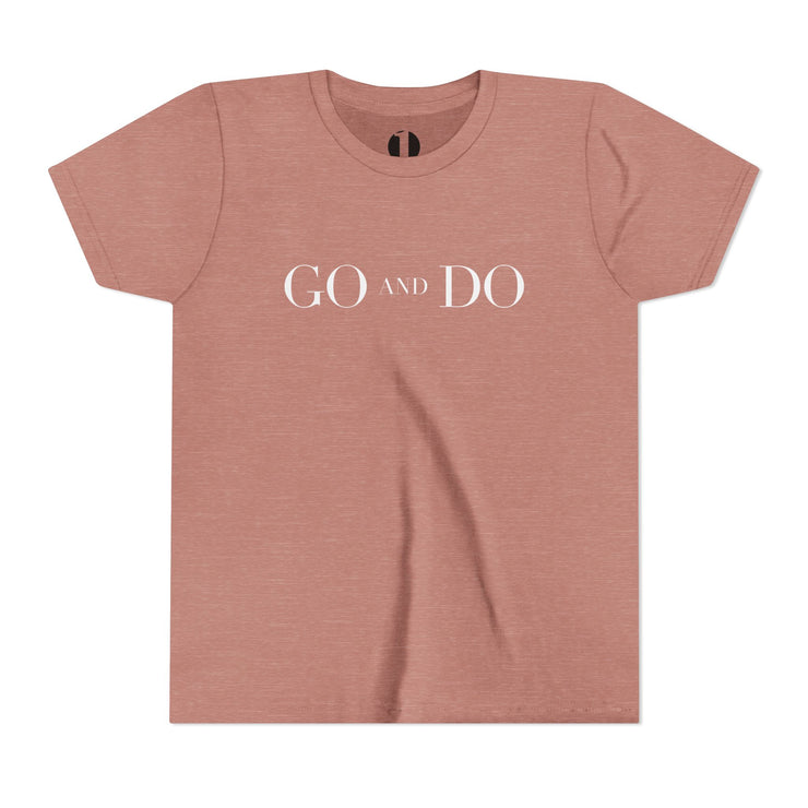 Mauve t-shirt with 'GO AND DO' text on a white background