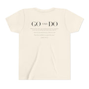 Cream t-shirt with text on a white background