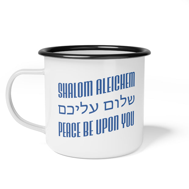 White mug with black rim and blue text displaying 'Shalom Aleichem' and 'Peace be upon you' on a white background.